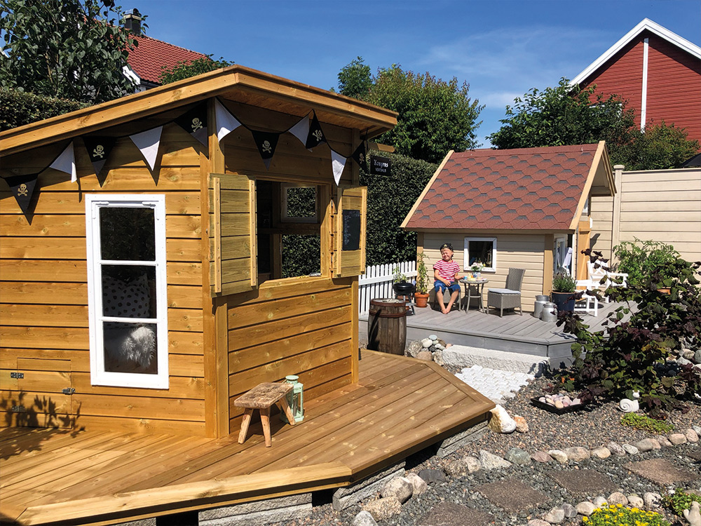 Bilde av Vertshus og lekestue i hagen hos finalist nummer 2 i Barnas Trepris 2023